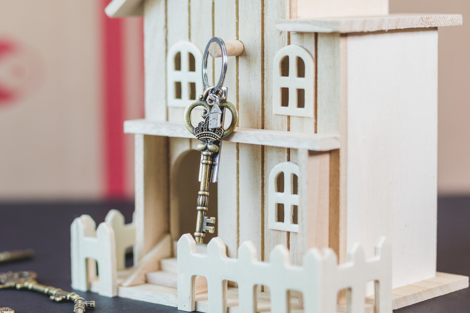 a miniature replacement property with a key on it