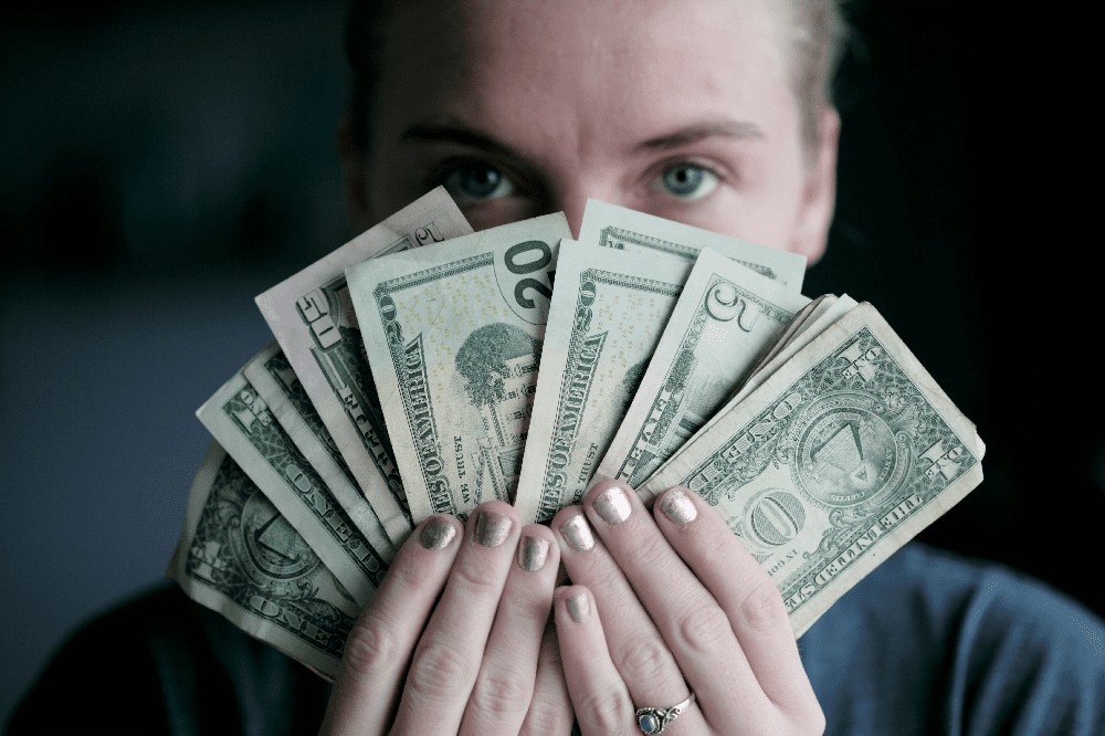 woman with money in hands